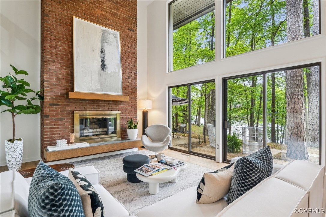 4460 Cheyenne Road Richmond, VA 23235 - Photo 17 of 47 Living room featuring wood finished floors, a towe