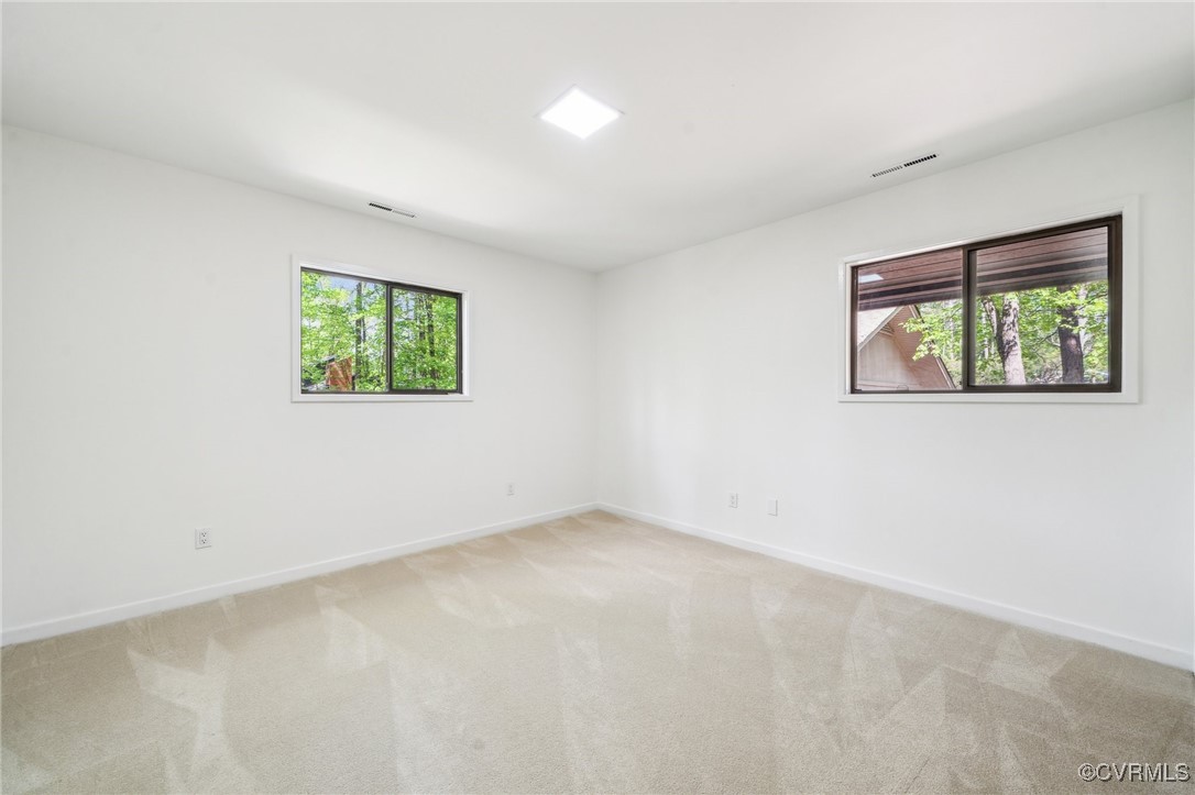4460 Cheyenne Road Richmond, VA 23235 - Photo 38 of 47 Carpeted empty room with visible vents, baseboards