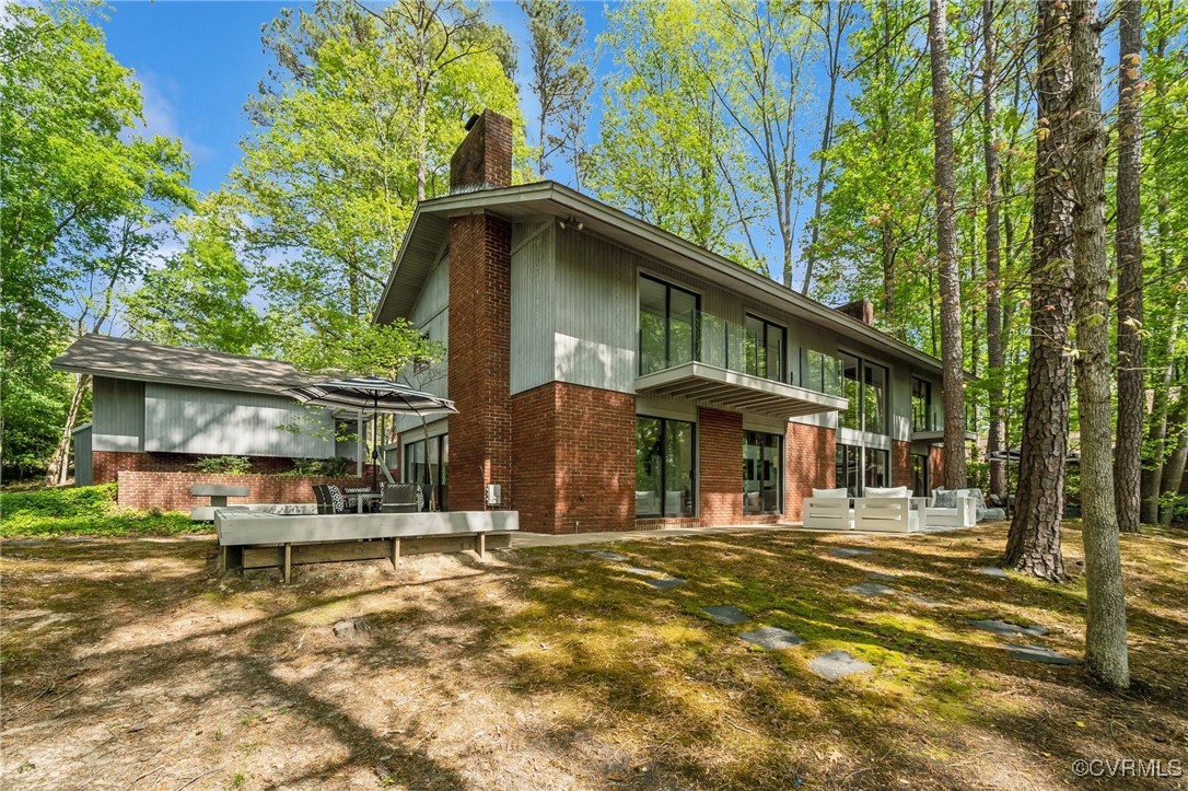 4460 Cheyenne Road Richmond, VA 23235 - Photo 4 of 47 Rear view of property featuring brick siding and a