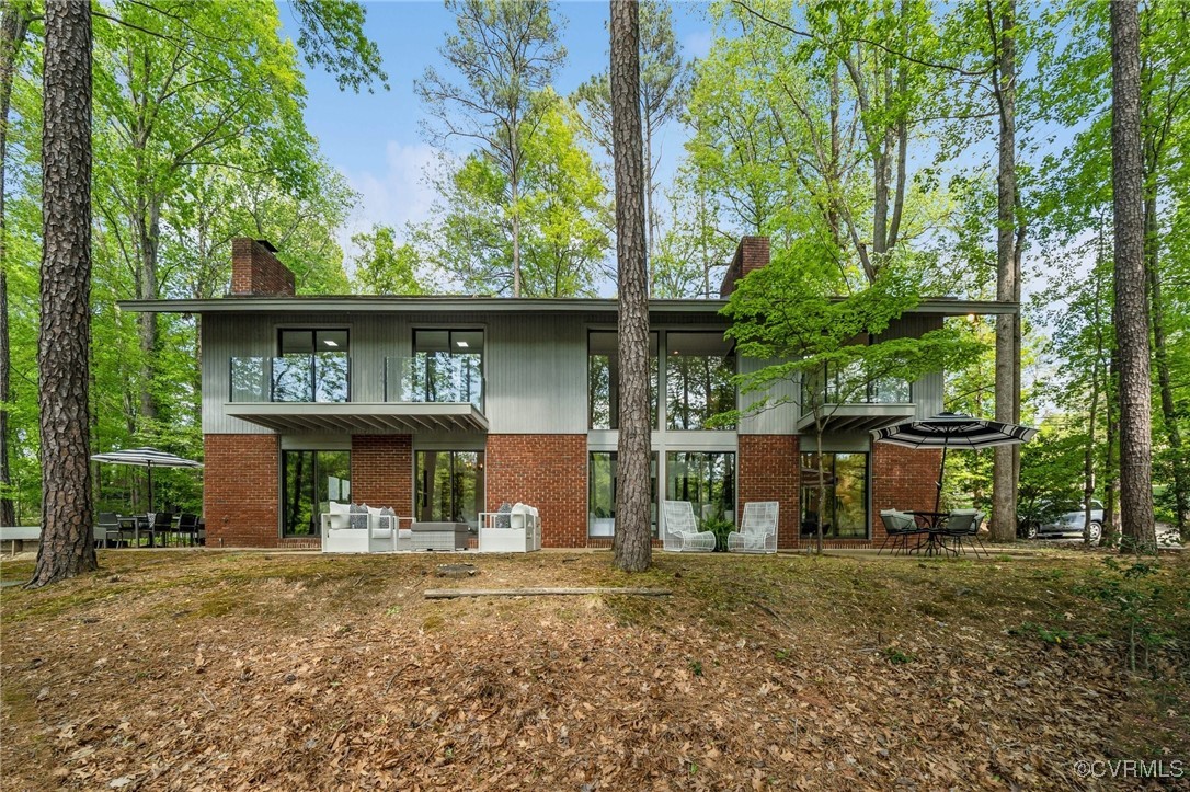 4460 Cheyenne Road Richmond, VA 23235 - Photo 5 of 47 Back of house featuring a chimney, brick siding, a