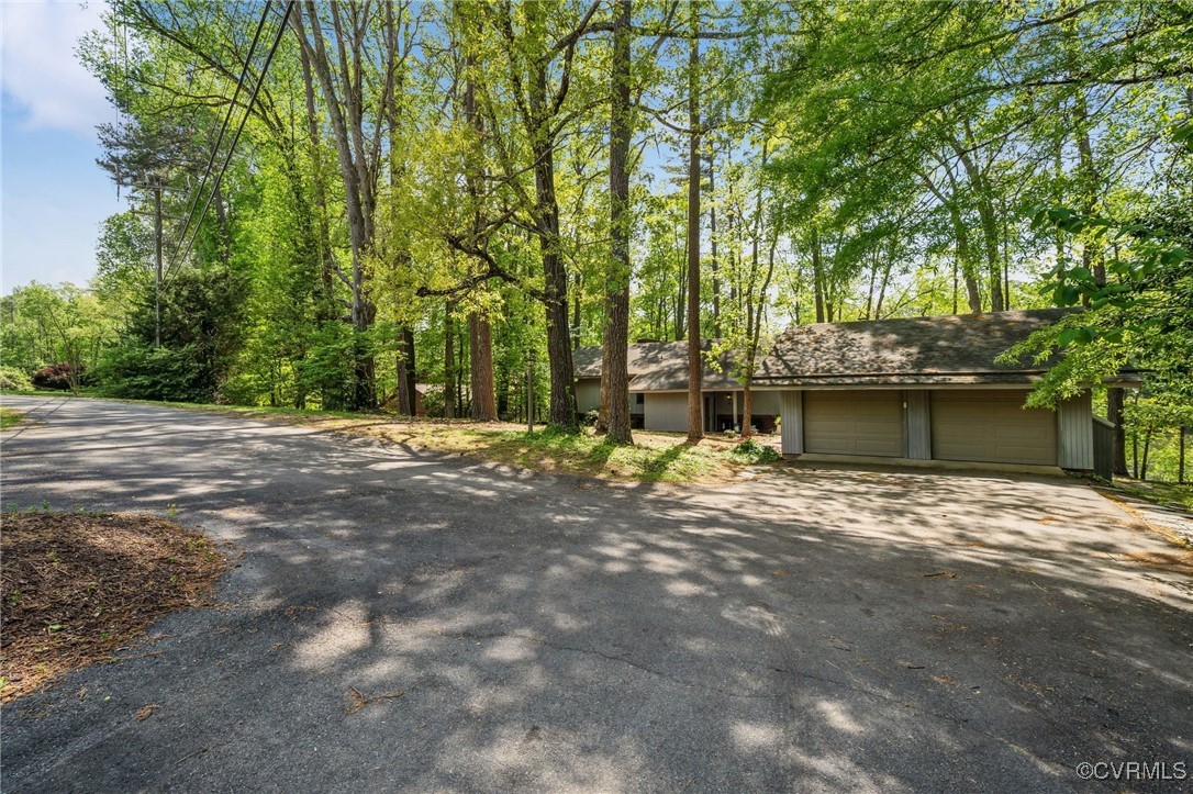 4460 Cheyenne Road Richmond, VA 23235 - Photo 9 of 47 View of front of house with aphalt driveway and a