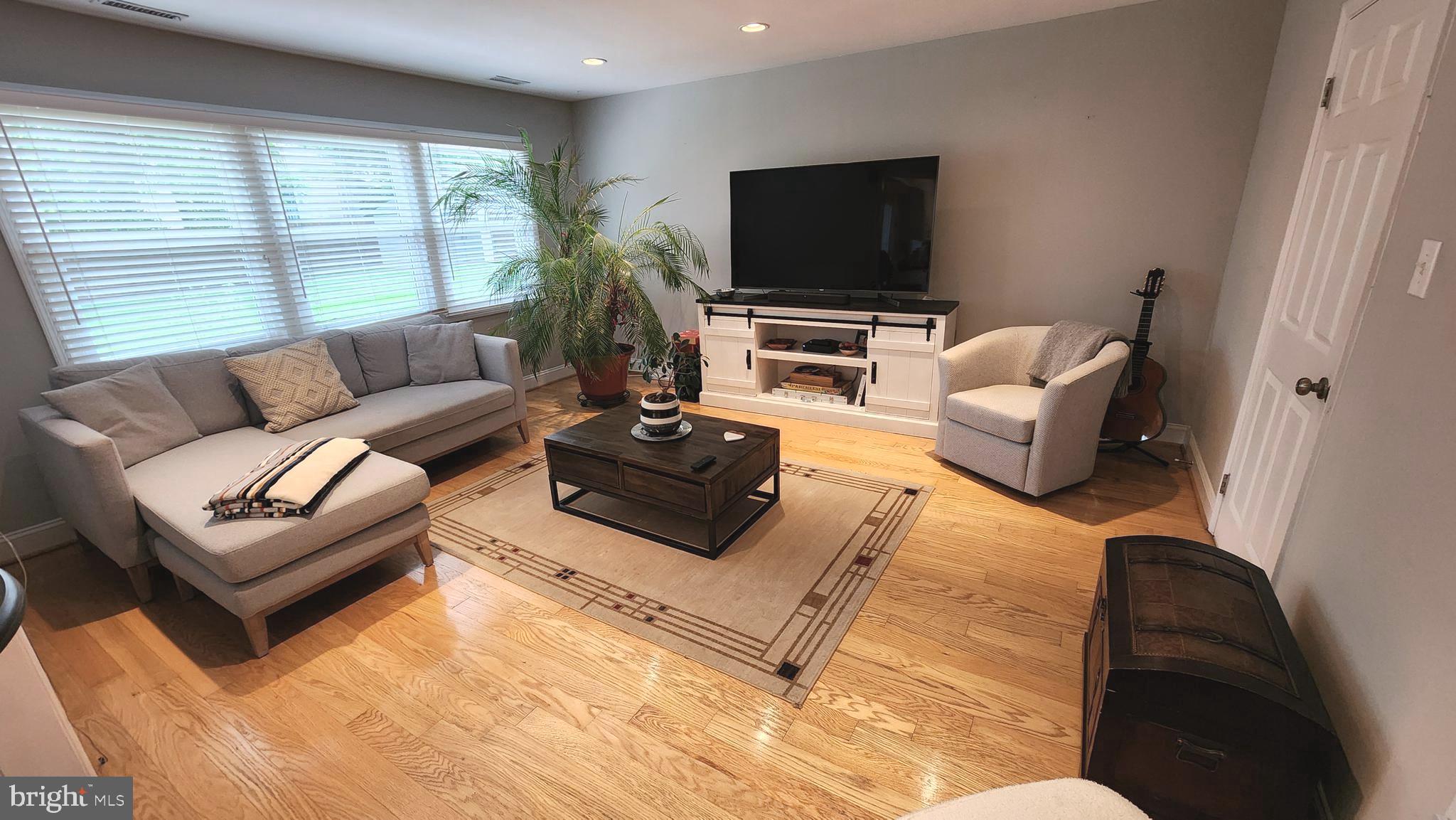 14004 Beechvue Lane Silver Spring, MD 20906 - Photo 6 of 57 Family room w/hardwood floors