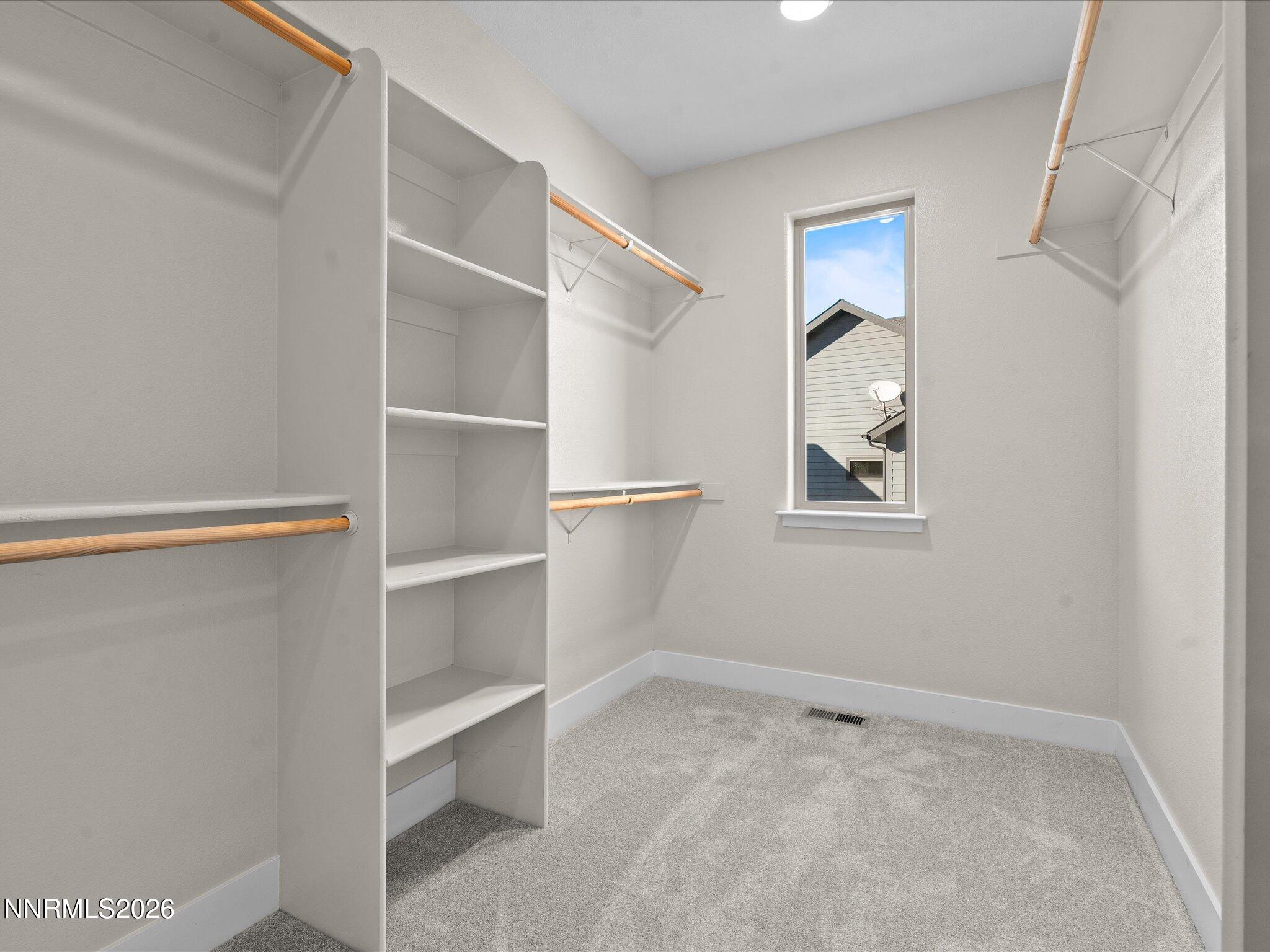 5585 East Hidden Valley Drive Reno, NV 89502 - Photo 22 of 40 a view of an empty room with a window