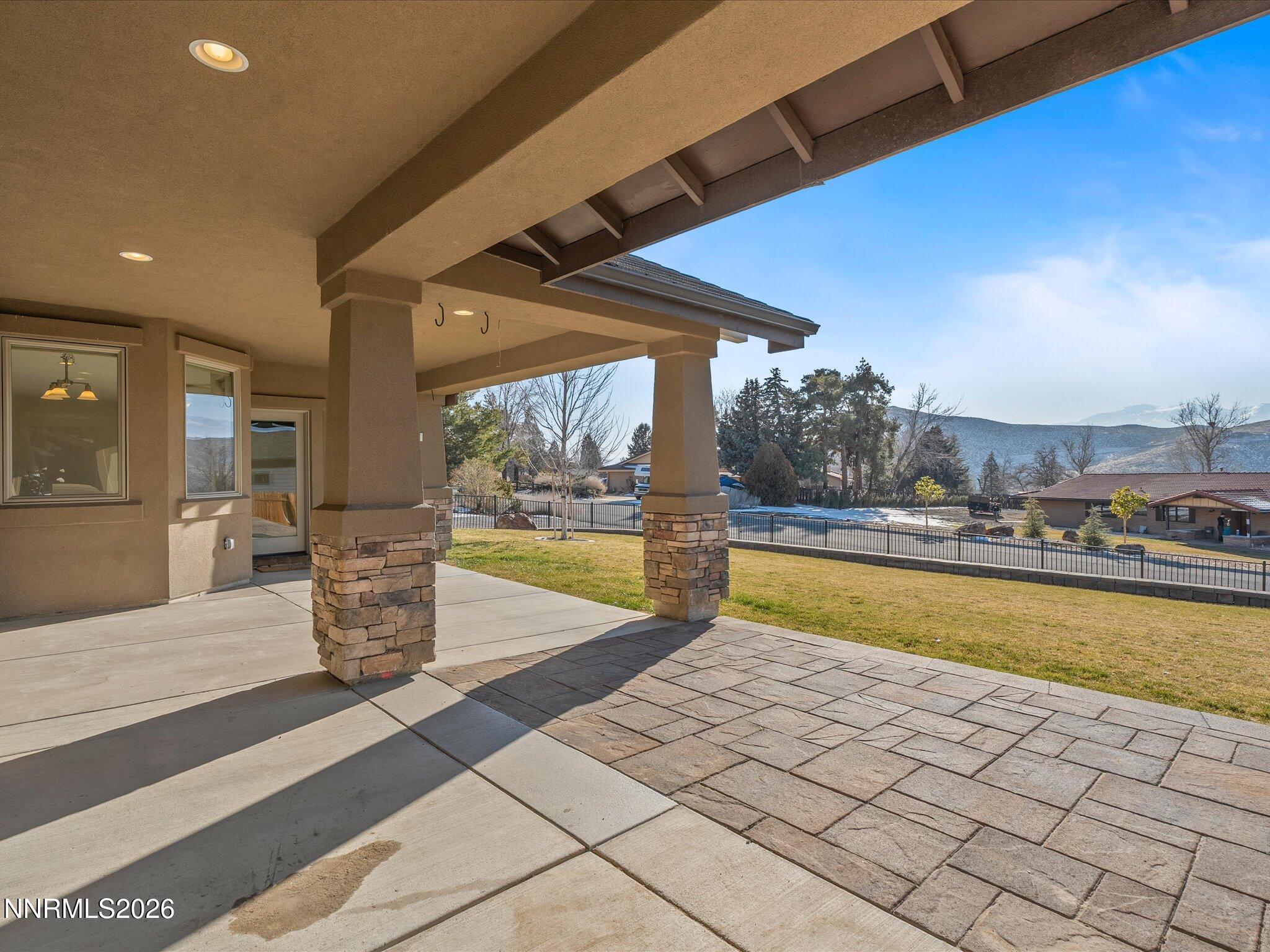 5585 East Hidden Valley Drive Reno, NV 89502 - Photo 34 of 40 a view of swimming pool with outdoor seating
