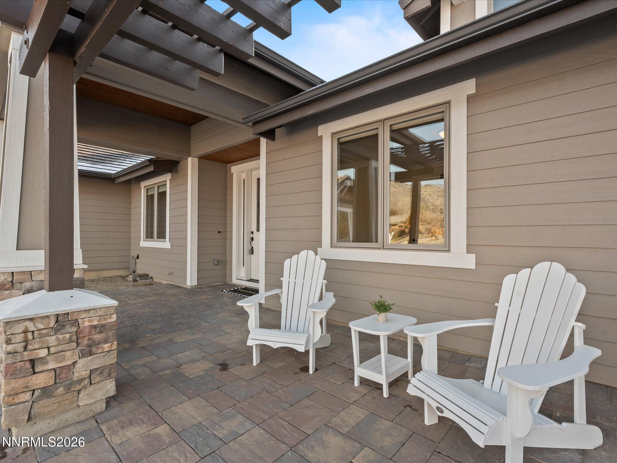 5585 East Hidden Valley Drive Reno, NV 89502 - Photo 4 of 40 a view of an outdoor space with porch
