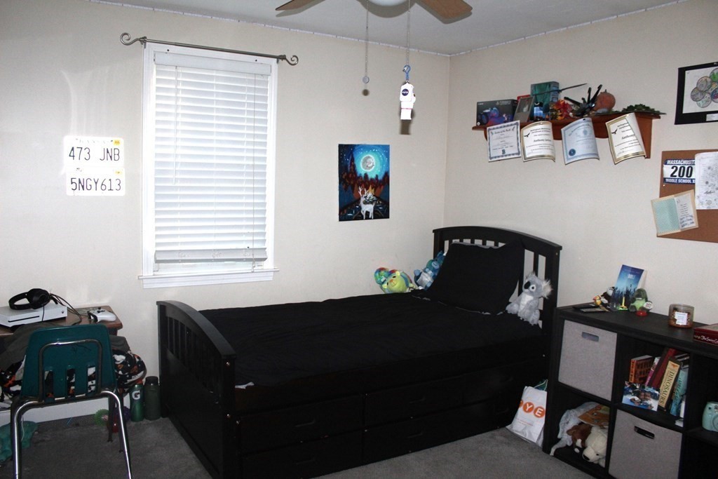 25 3rd Avenue Bellingham, MA 02019 - Photo 13 of 20 a bedroom with a bed and wooden floor
