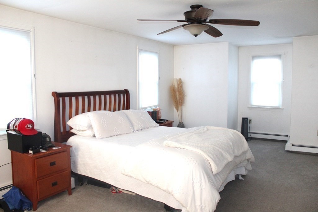 25 3rd Avenue Bellingham, MA 02019 - Photo 17 of 20 a bedroom with bed and window