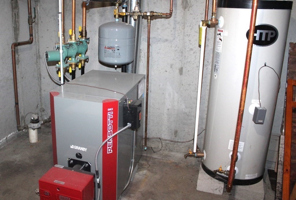 25 3rd Avenue Bellingham, MA 02019 - Photo 19 of 20 a close view of water heater room