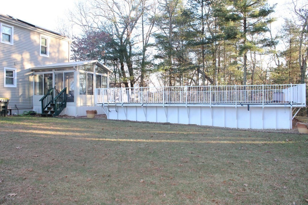 25 3rd Avenue Bellingham, MA 02019 - Photo 20 of 20 a front view of a house with a yard