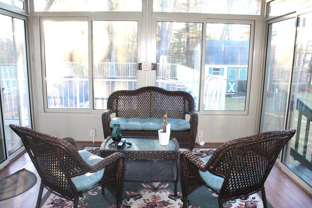 25 3rd Avenue Bellingham, MA 02019 - Photo 9 of 20 a living room with furniture and a window
