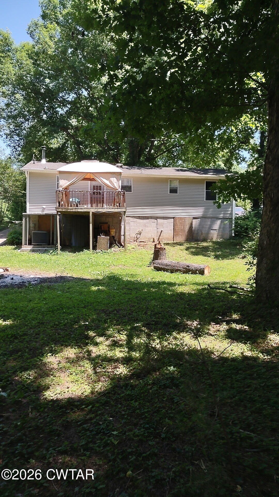 195 Ridge Road Medina, TN 38355 - Photo 10 of 14 a view of a house with a yard
