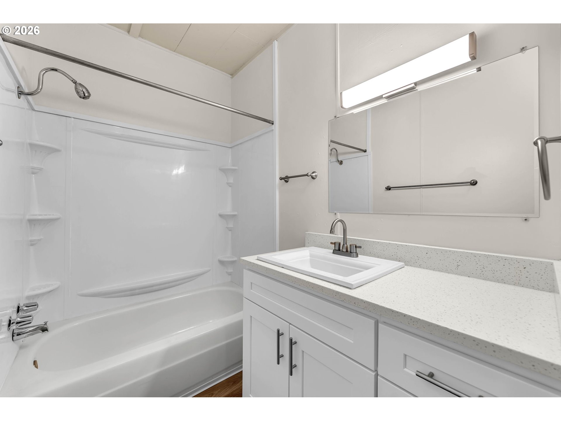 647 Southeast Russell Street Camas, WA 98607 - Photo 14 of 21 a bathroom with a sink and a mirror