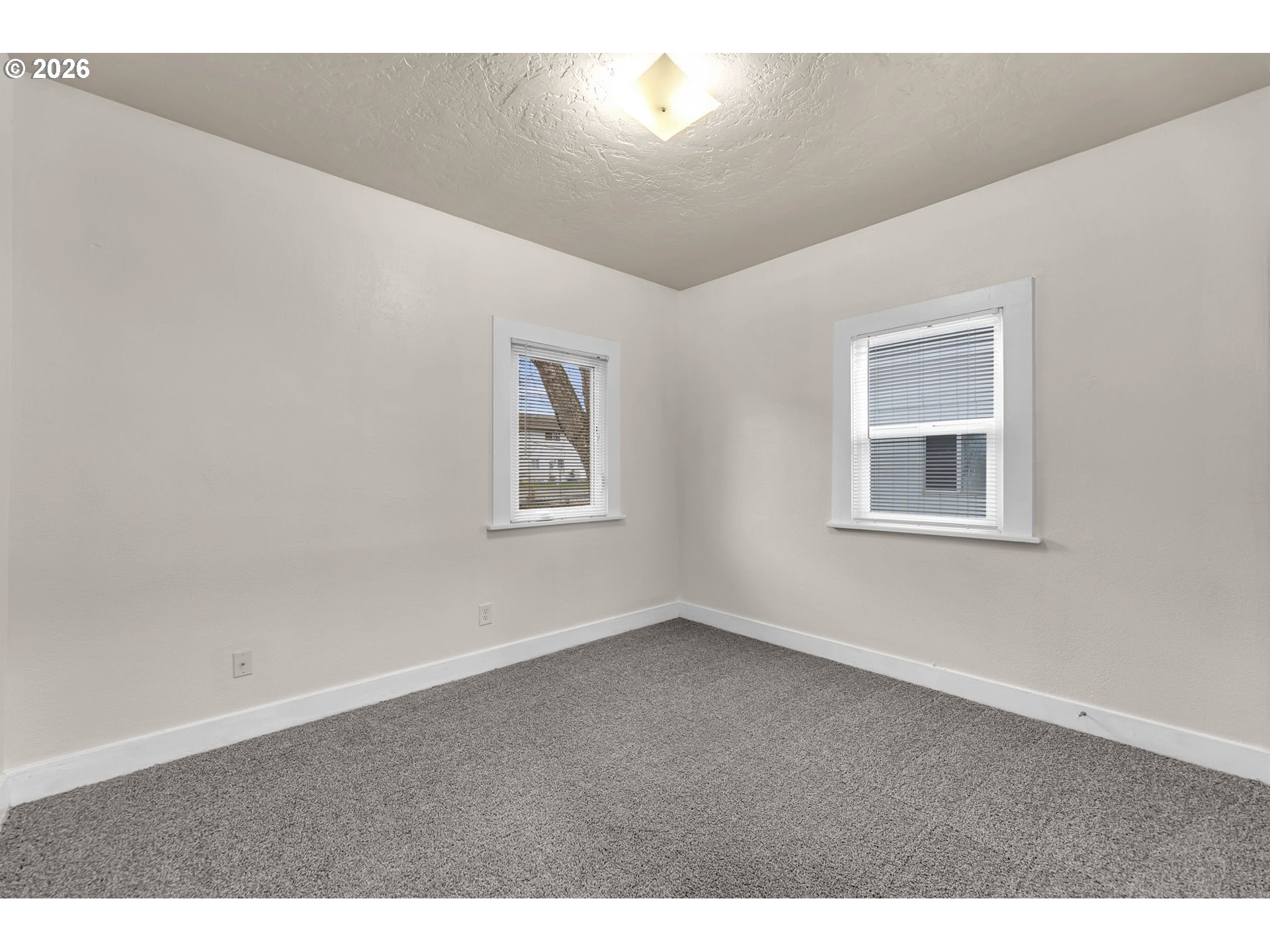 647 Southeast Russell Street Camas, WA 98607 - Photo 15 of 21 a view of an empty room with a window