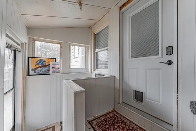 a room with window and a table