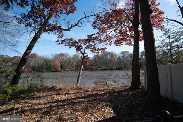 a view of a backyard of the house