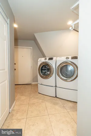 a utility room with a washer and dryer