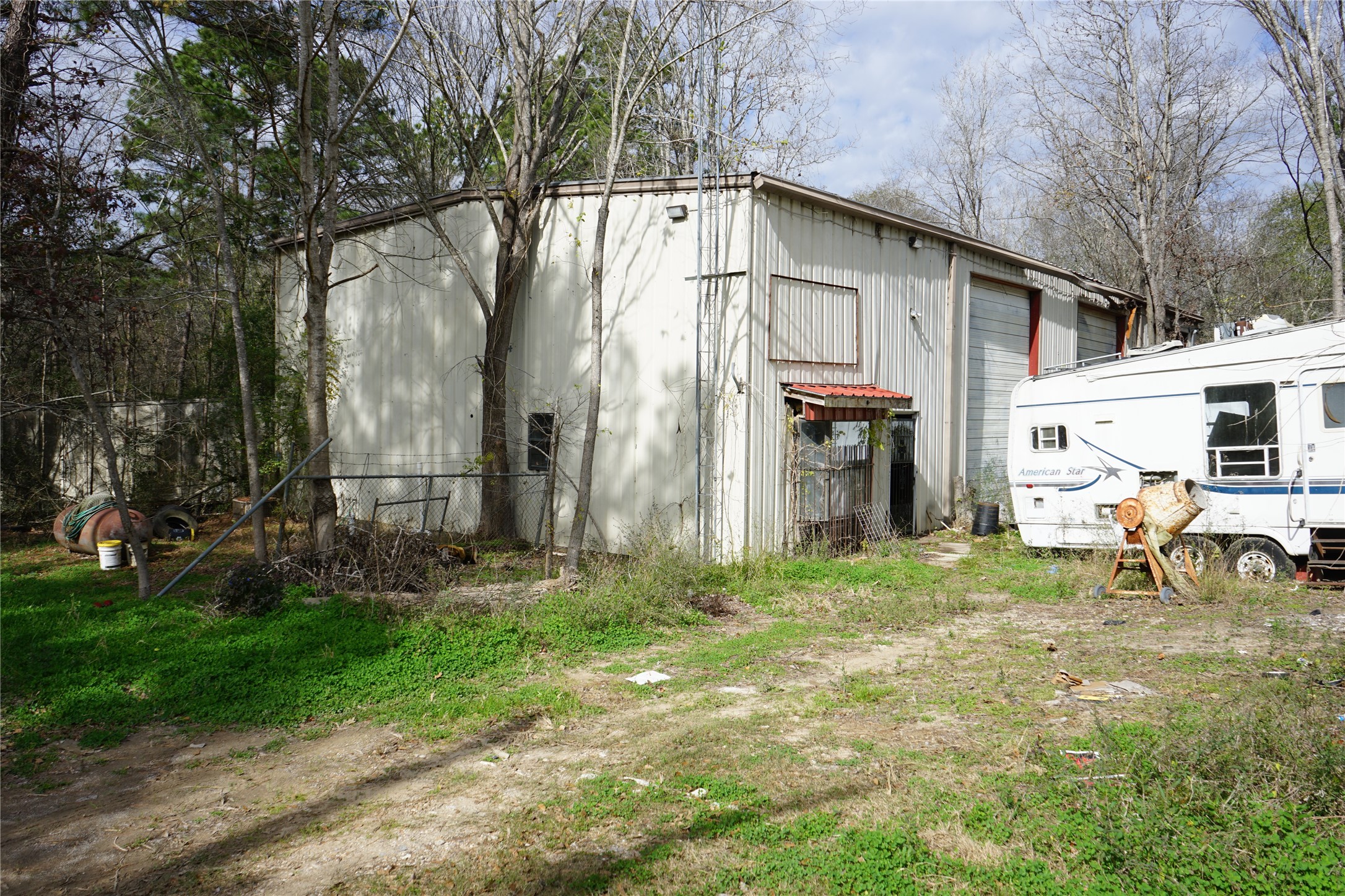 140 Mosely Livingston, TX 77351 - Photo 5 of 9 a backyard of a house with barbeque oven table and chairs