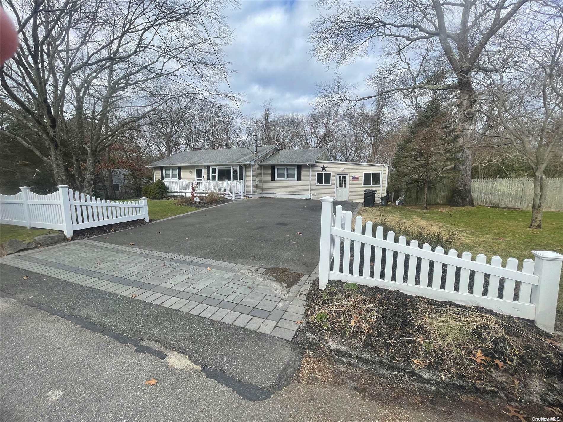 21 Karls Road Yaphank, NY 11980 - Photo 1 of 1 a view of a house with a yard