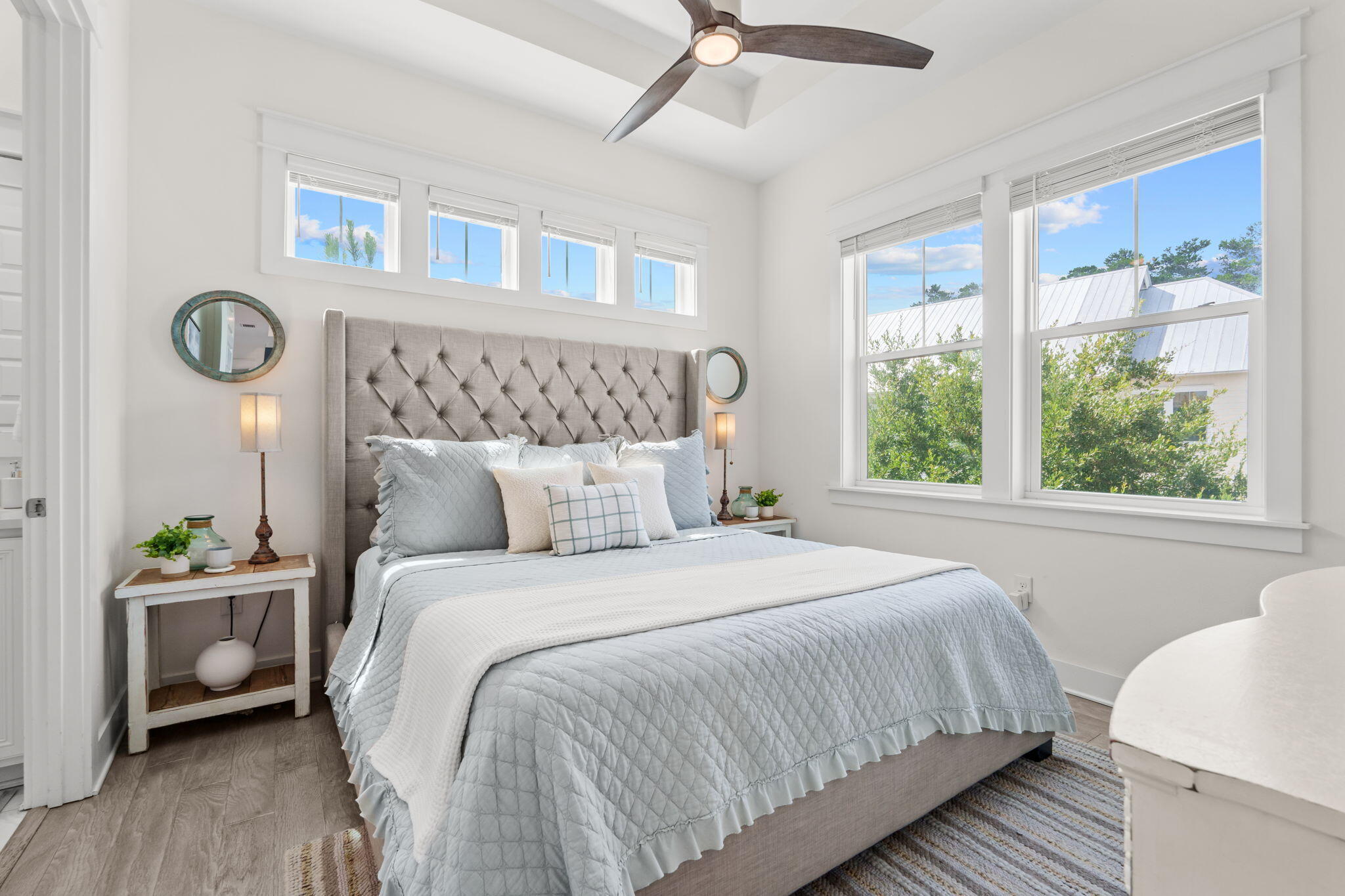 268 Milestone Dr Inlet Beach, Unit C Inlet Beach, FL 32461 - Photo 16 of 34 a bedroom with a bed and a window