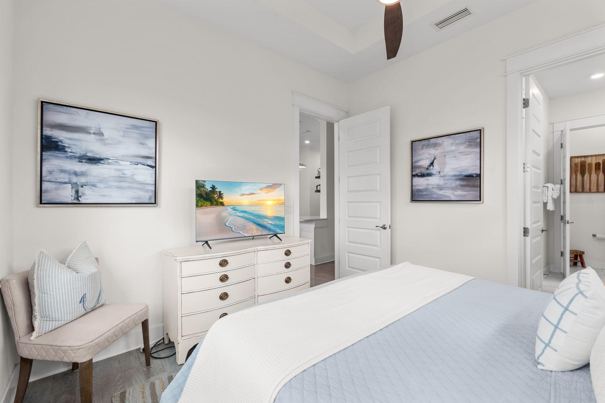 268 Milestone Dr Inlet Beach, Unit C Inlet Beach, FL 32461 - Photo 18 of 34 a bedroom with a bed and furniture