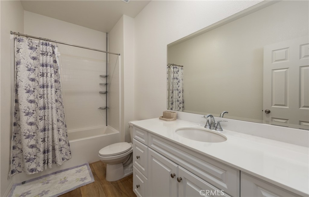 19778 Limon Court Riverside, CA 92507 - Photo 20 of 26 a bathroom with a sink toilet tub and shower