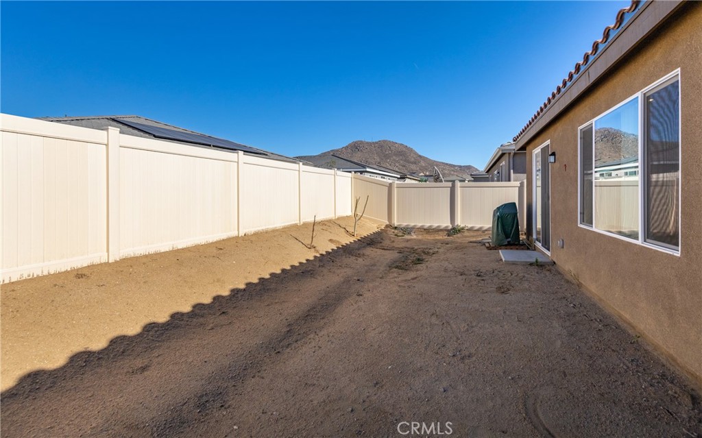 19778 Limon Court Riverside, CA 92507 - Photo 23 of 26 a view of a house with a big yard