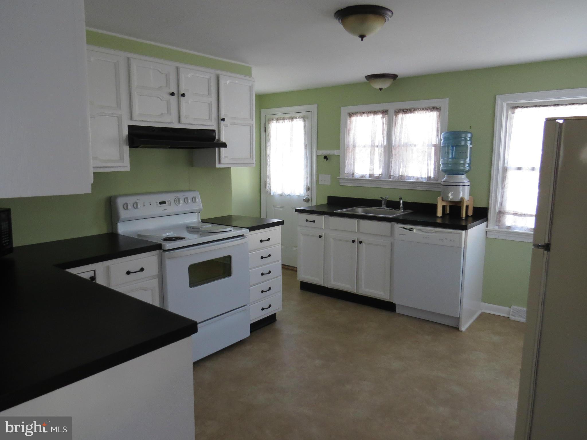 215 Maloney Road Elkton, MD 21921 - Photo 5 of 12 Kitchen with lots of cabinets and sunshine!