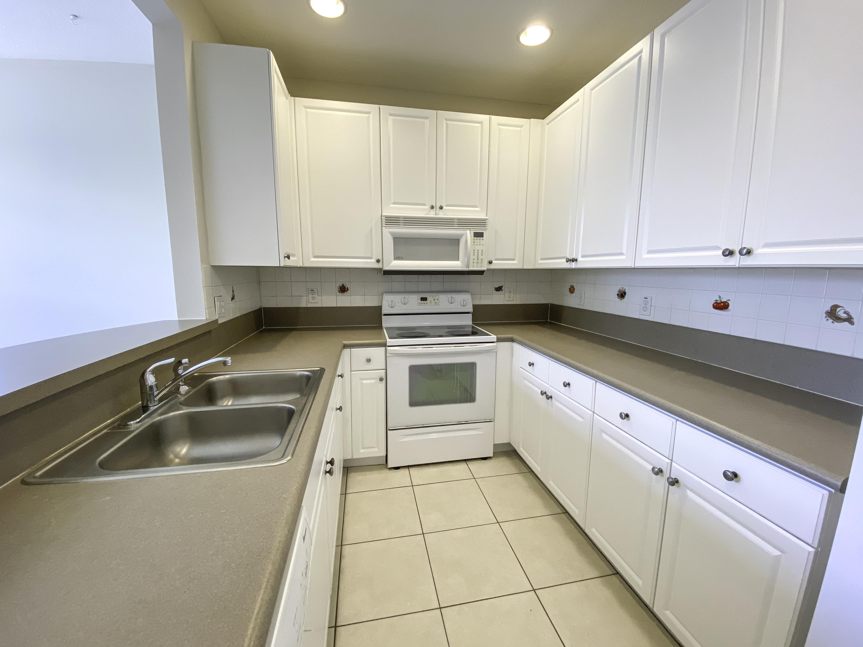 1480 Corbison Point Place Jupiter, FL 33458 - Photo 7 of 28 Kitchen