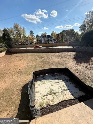 a view of street along with trees