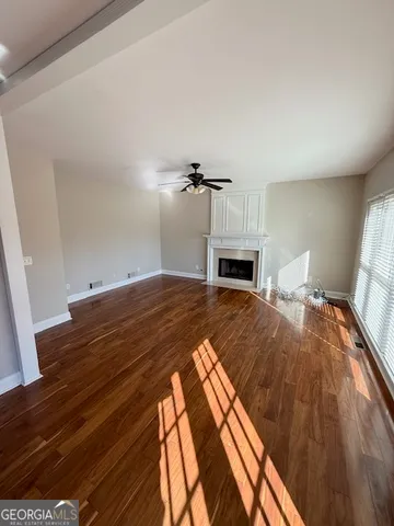 a bedroom with a bed and a fireplace