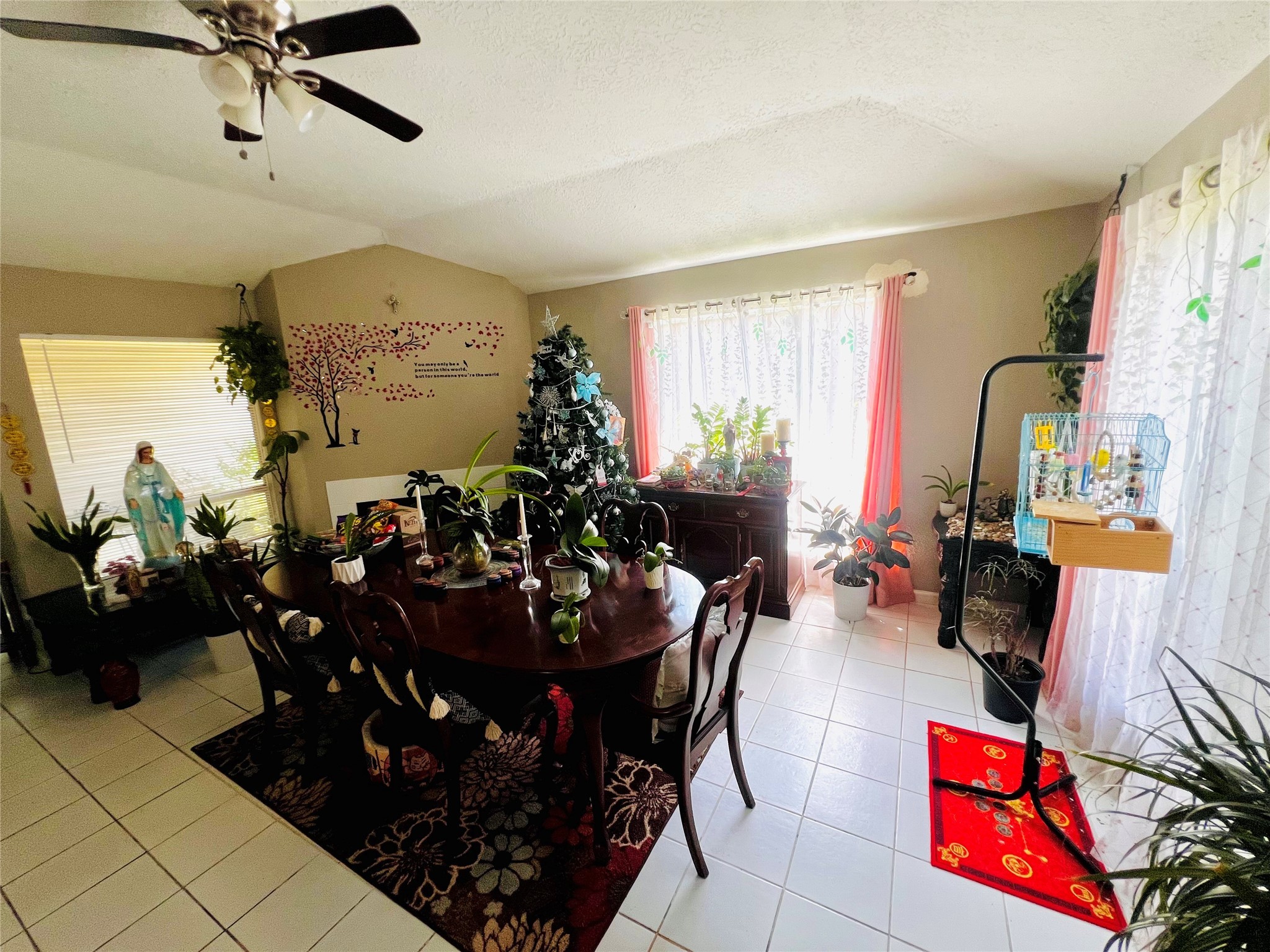 9415 Danforth Way Houston, TX 77083 - Photo 3 of 10 a living room with furniture and a chandelier