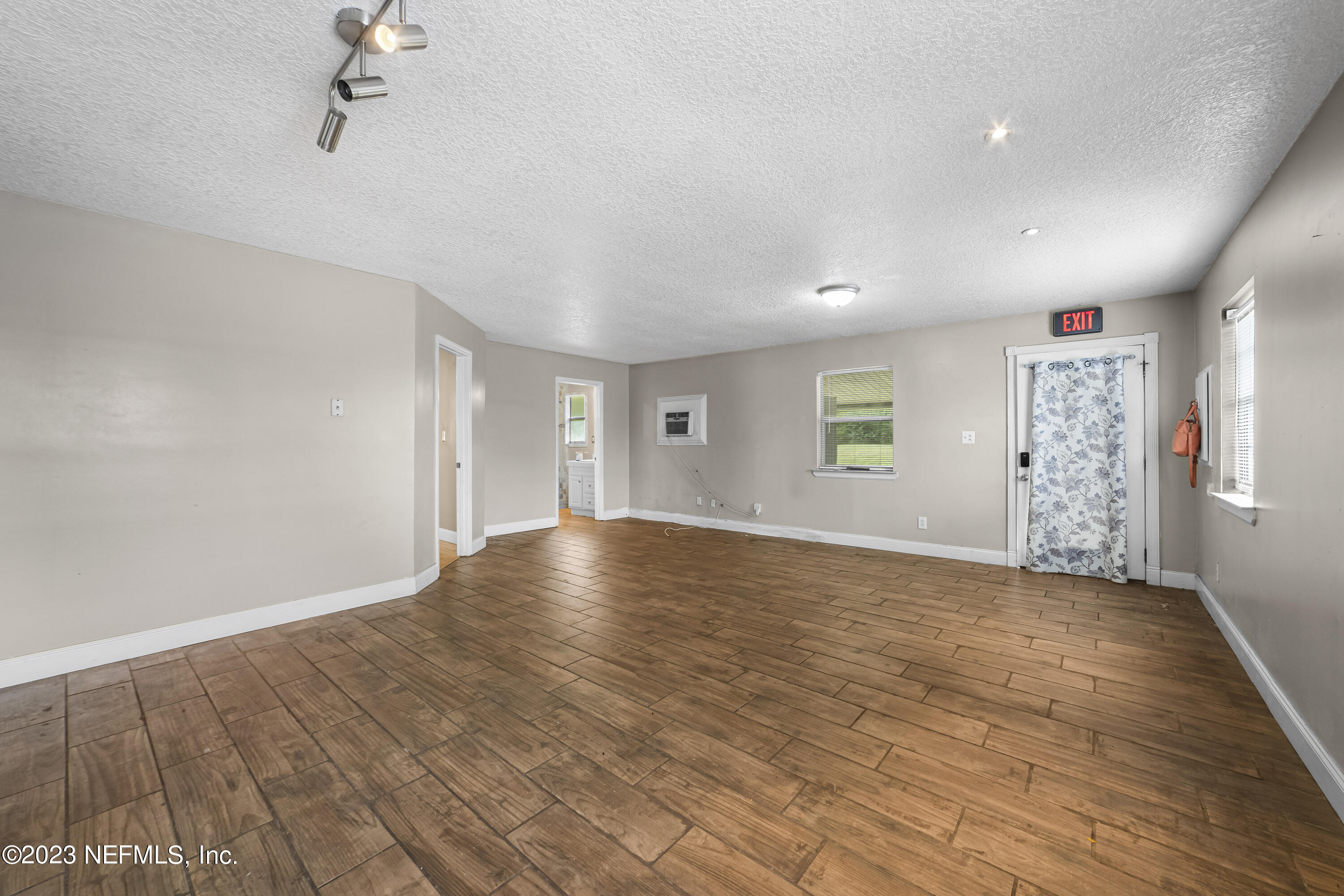 54412 Church Road Callahan, FL 32011 - Photo 38 of 47 a view of empty room with wooden floor and fan