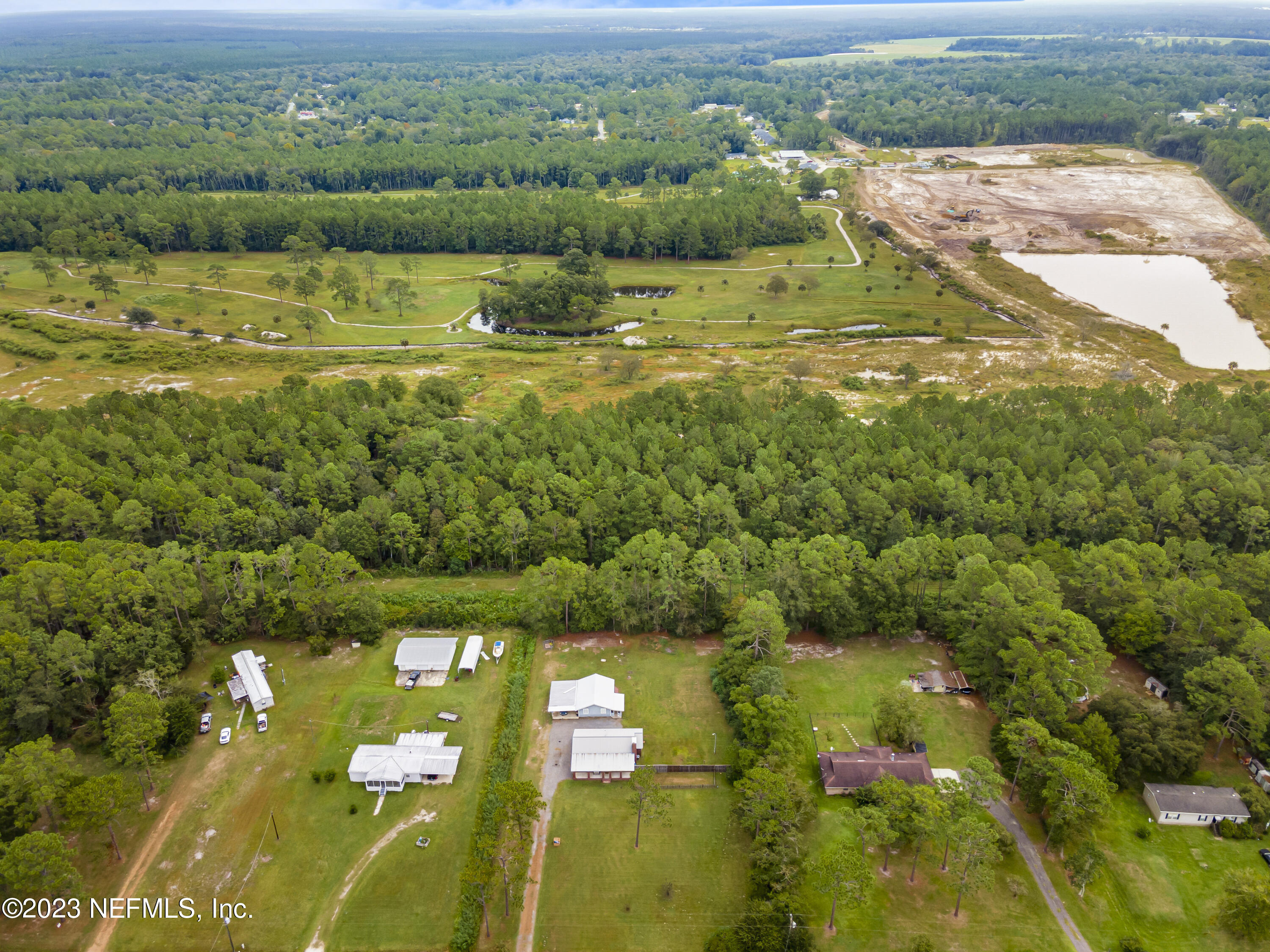 54412 Church Road Callahan, FL 32011 - Photo 5 of 47 a view of lake with green space