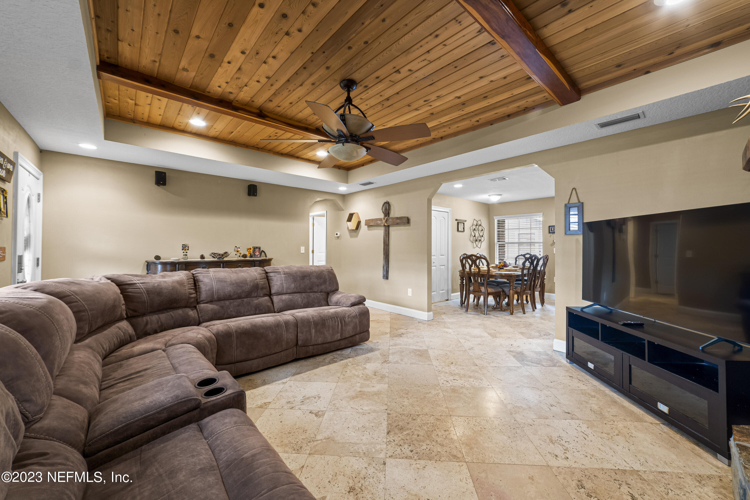 54412 Church Road Callahan, FL 32011 - Photo 9 of 47 a living room with furniture and a flat screen tv