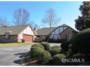 801 Golden Road Tryon, NC 28782 - Photo 1 of 24 a view of a house with a yard