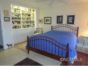 801 Golden Road Tryon, NC 28782 - Photo 11 of 24 a bedroom with a bed and dresser