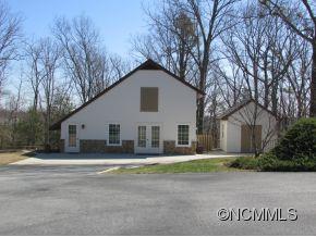 801 Golden Road Tryon, NC 28782 - Photo 18 of 24 a front view of a house with a yard