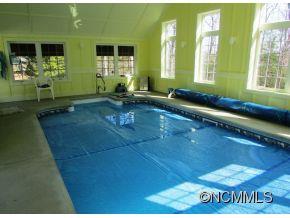 801 Golden Road Tryon, NC 28782 - Photo 20 of 24 a lobby with furniture and floor to ceiling window