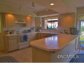 801 Golden Road Tryon, NC 28782 - Photo 6 of 24 a kitchen with sink and window