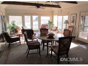 801 Golden Road Tryon, NC 28782 - Photo 8 of 24 a view of a dining room with furniture window and outside view
