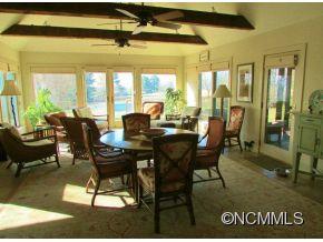 801 Golden Road Tryon, NC 28782 - Photo 9 of 24 a view of a dining room with furniture window and outside view