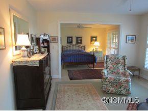 801 Golden Road Tryon, NC 28782 - Photo 10 of 24 a living room with furniture and a dresser