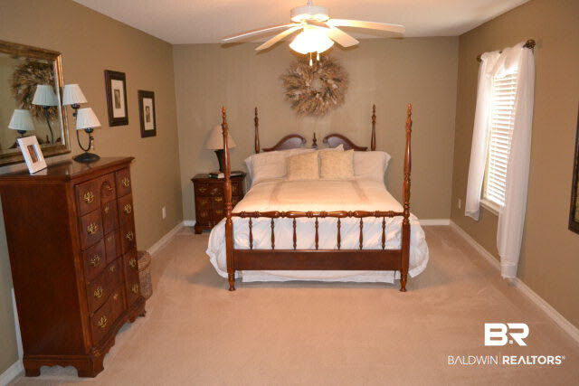 12191 Verona Court Foley, AL 36535 - Photo 21 of 21 The master bedroom is a spacious 12x18 feet. The home has a split floor plan