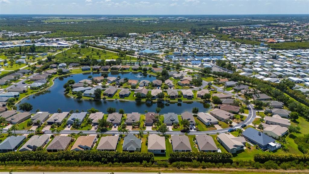 24604 Rio Villa Lakes Circle Punta Gorda, FL 33950 - Photo 14 of 28 a view of a city with an ocean