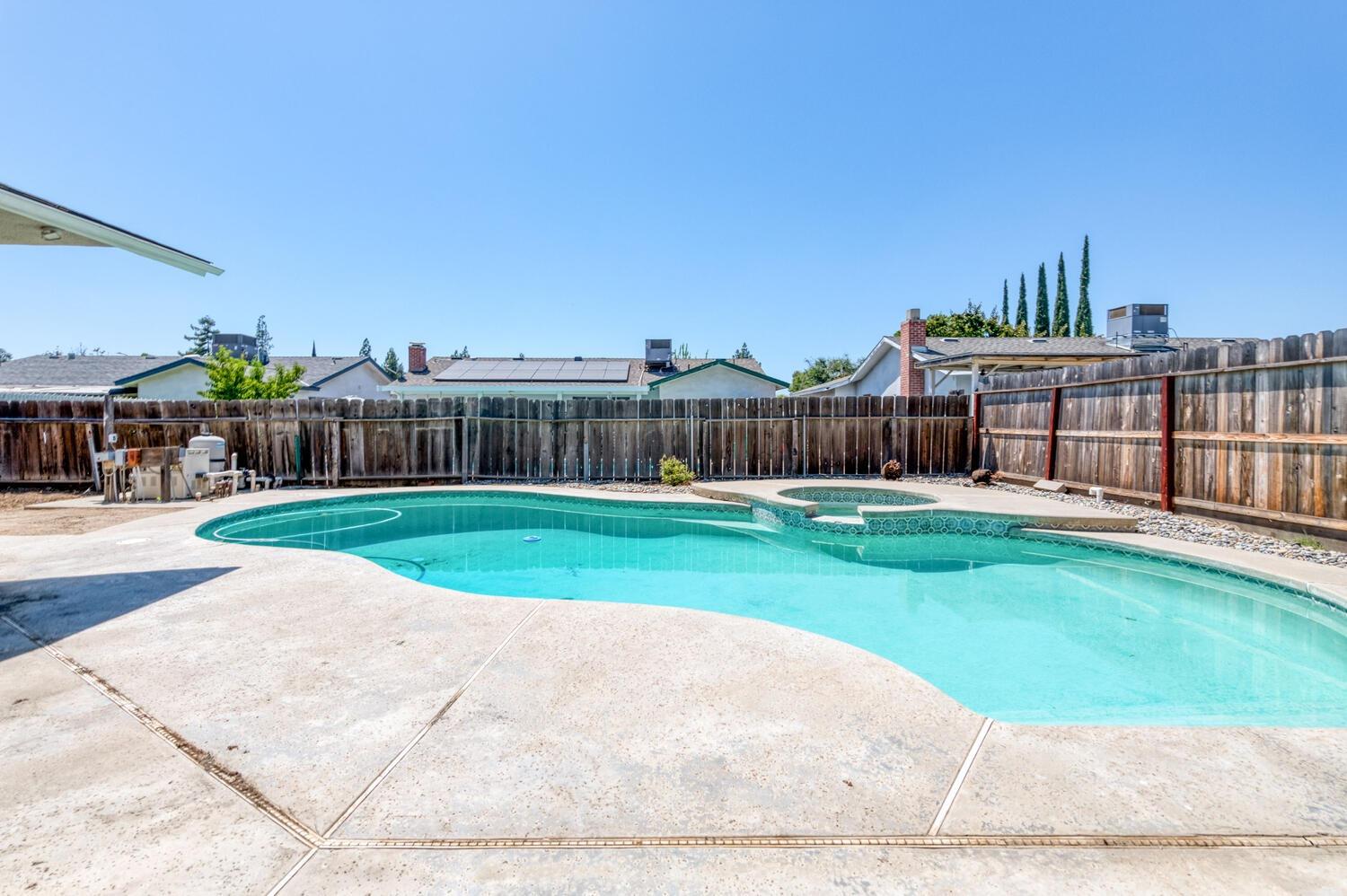 1626 Bliss Avenue Clovis, CA 93611 - Photo 28 of 31 a view of a garden with a house in the background