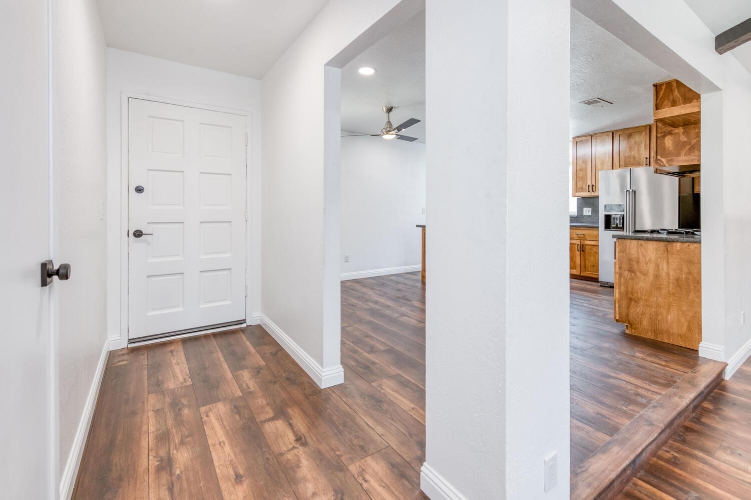 1626 Bliss Avenue Clovis, CA 93611 - Photo 3 of 31 wooden floor in an empty room