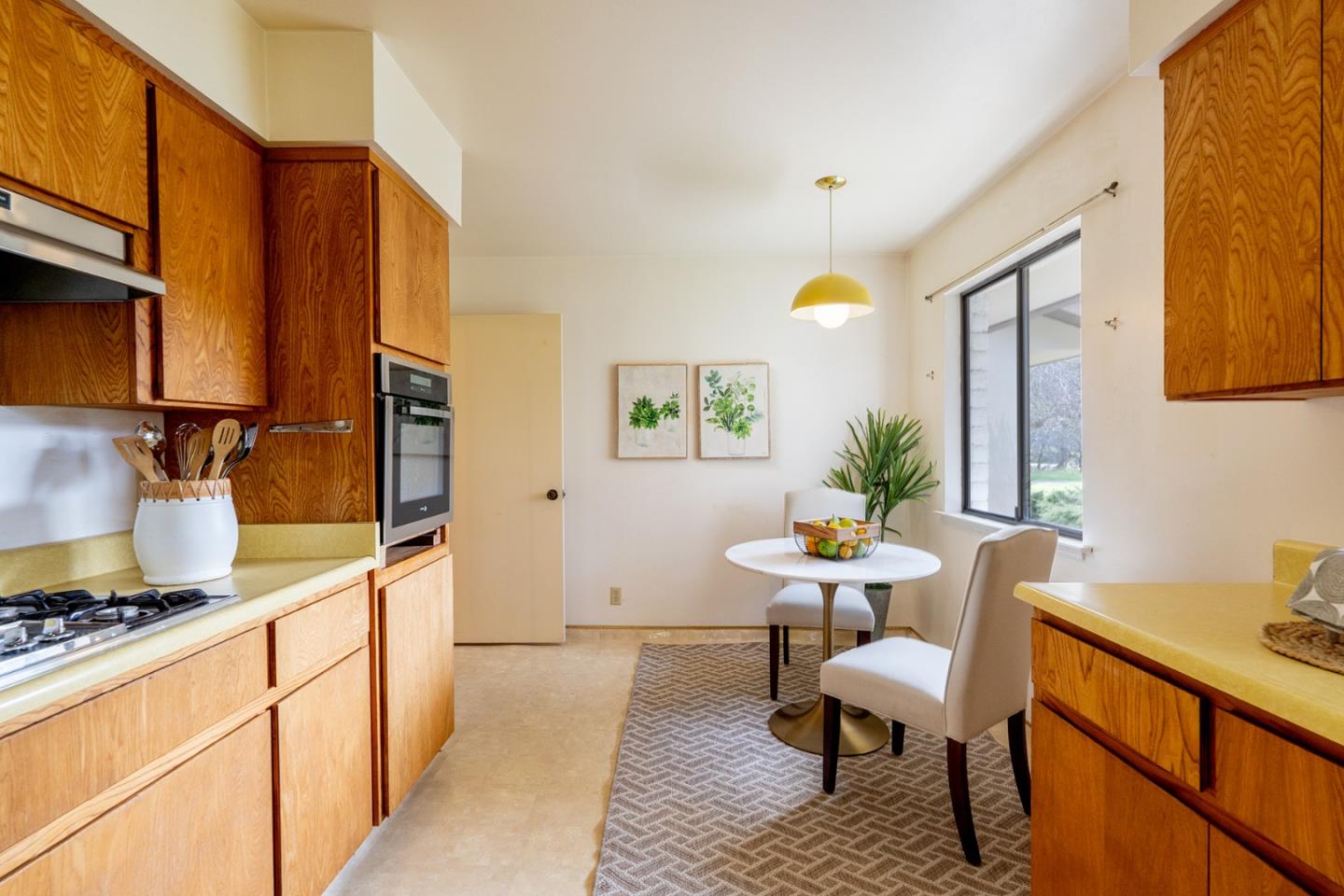 6405 Brookdale Drive Carmel, CA 93923 - Photo 12 of 32 a dining room with furniture and window