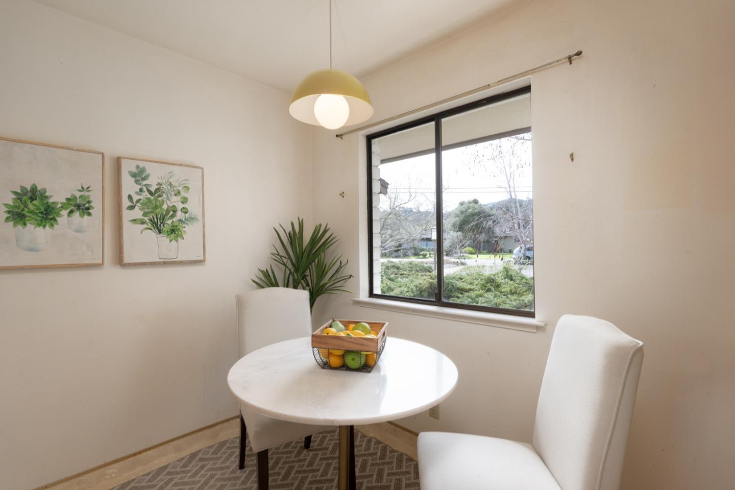 6405 Brookdale Drive Carmel, CA 93923 - Photo 13 of 32 a table and chairs in a room