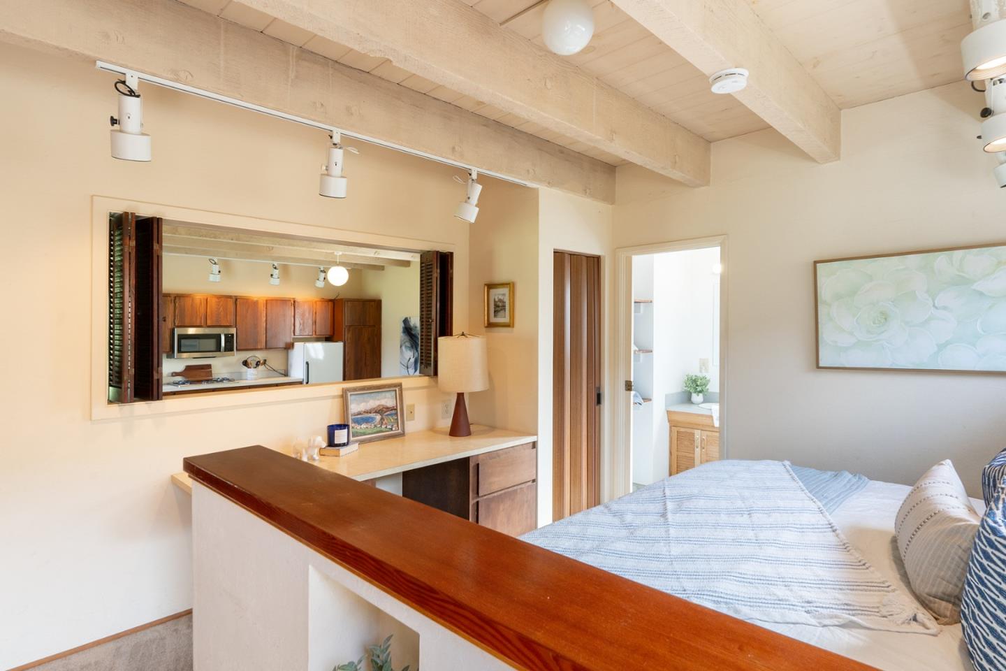 6405 Brookdale Drive Carmel, CA 93923 - Photo 27 of 32 a living room with stainless steel appliances kitchen island granite countertop furniture and a view of kitchen