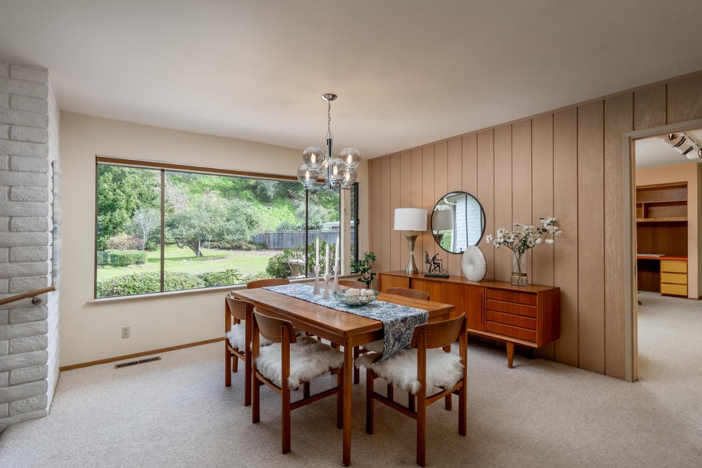 6405 Brookdale Drive Carmel, CA 93923 - Photo 9 of 32 a view of a dining room with furniture window and outside view